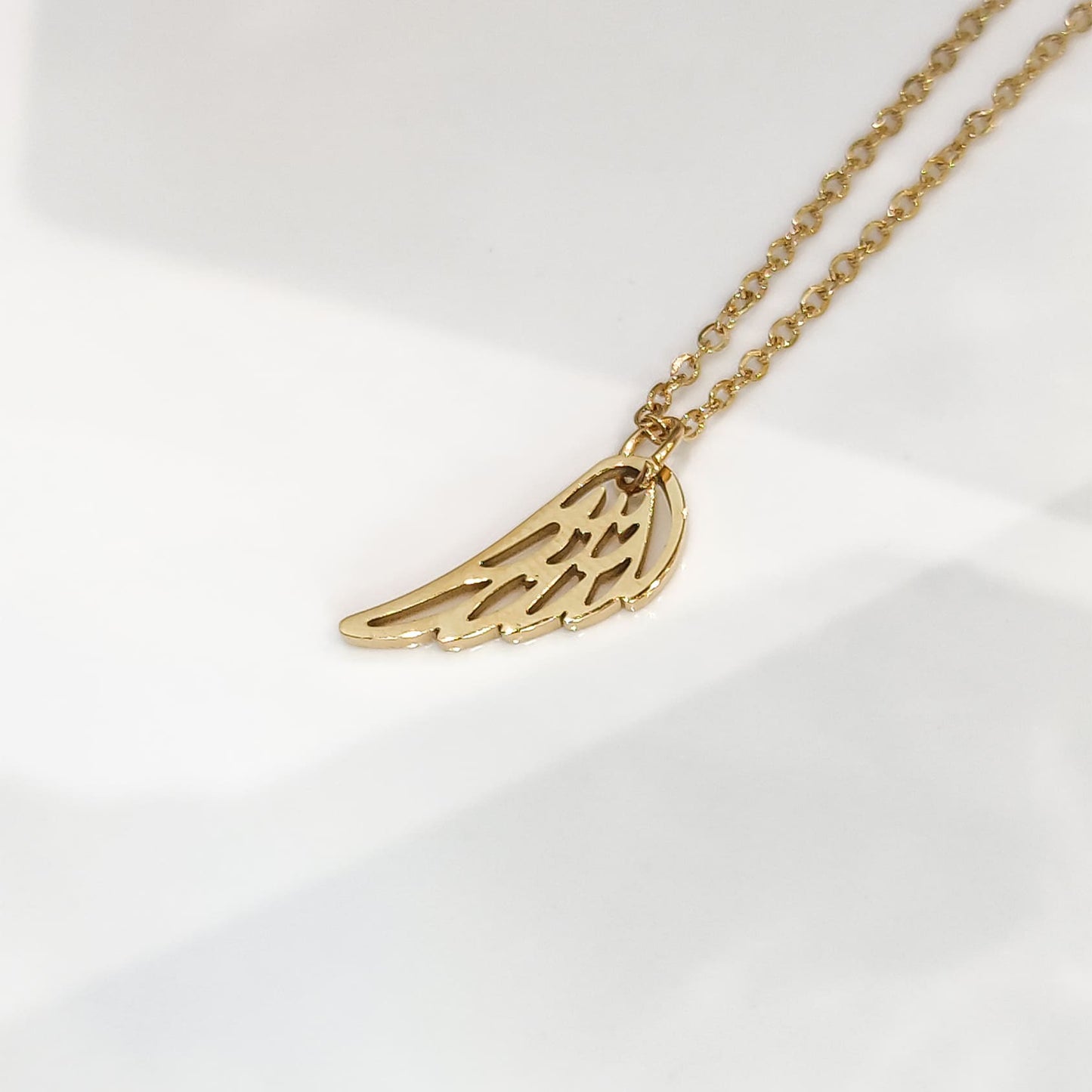 Collar solidario alas