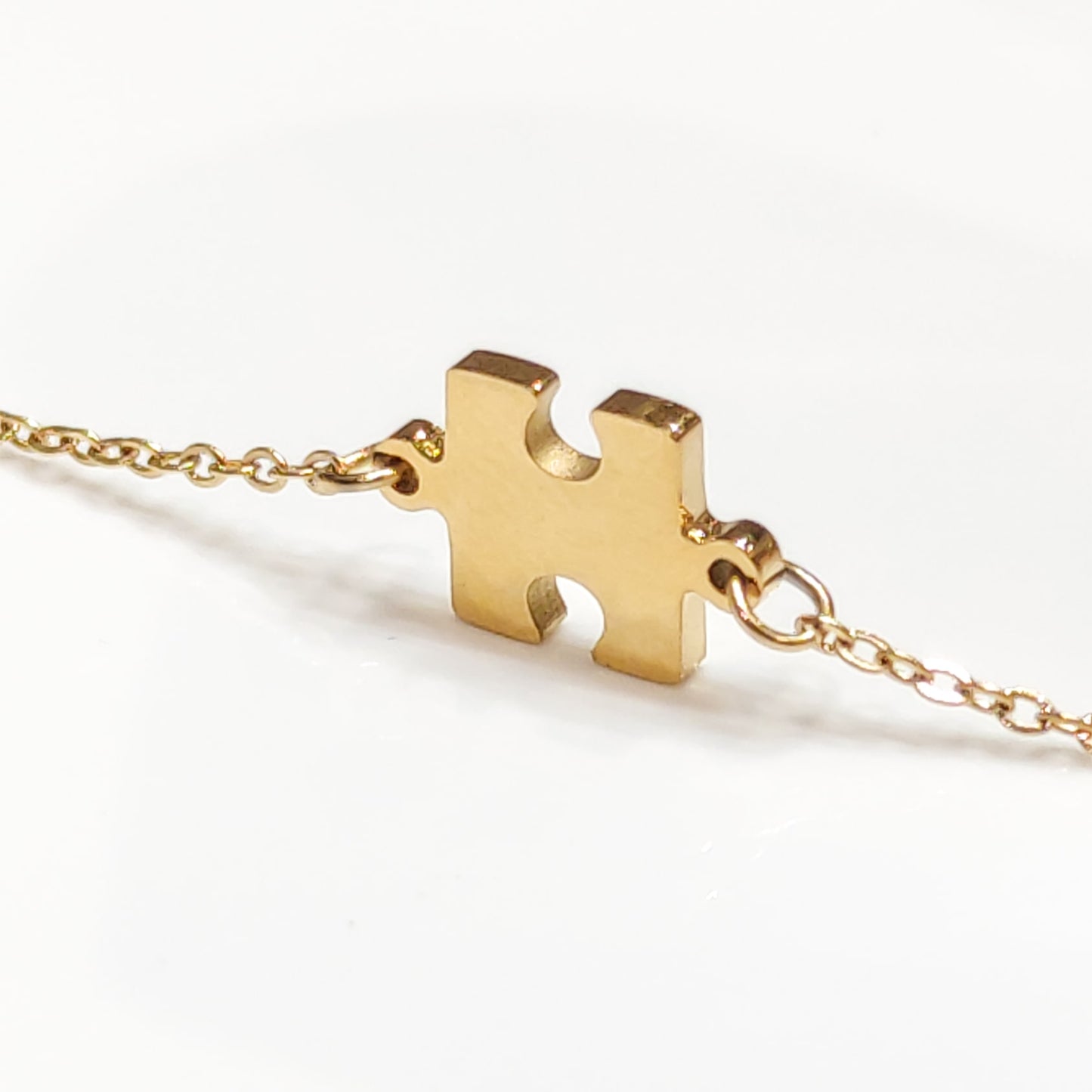Pulsera Puzzle solidario