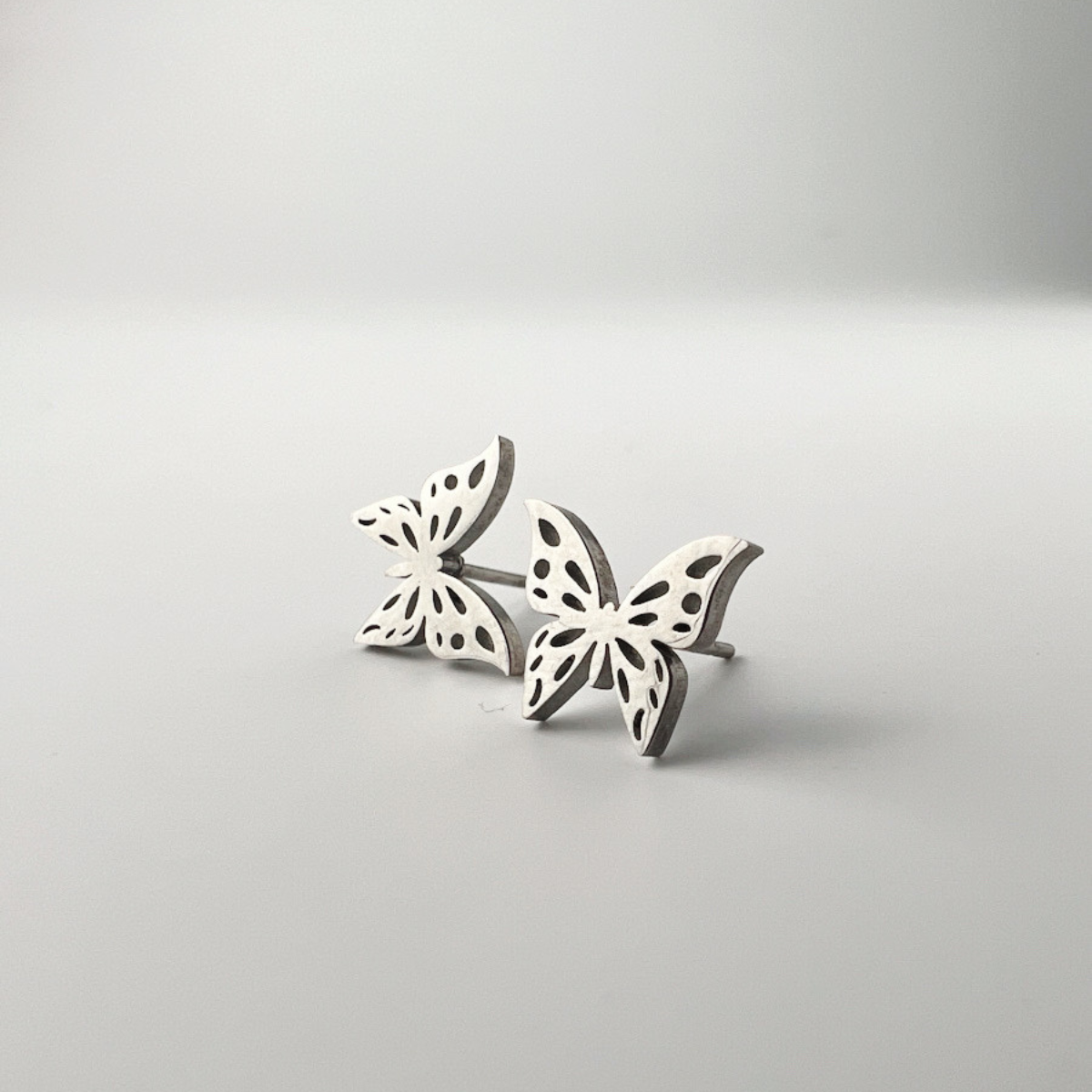 Pendientes solidarios mariposa