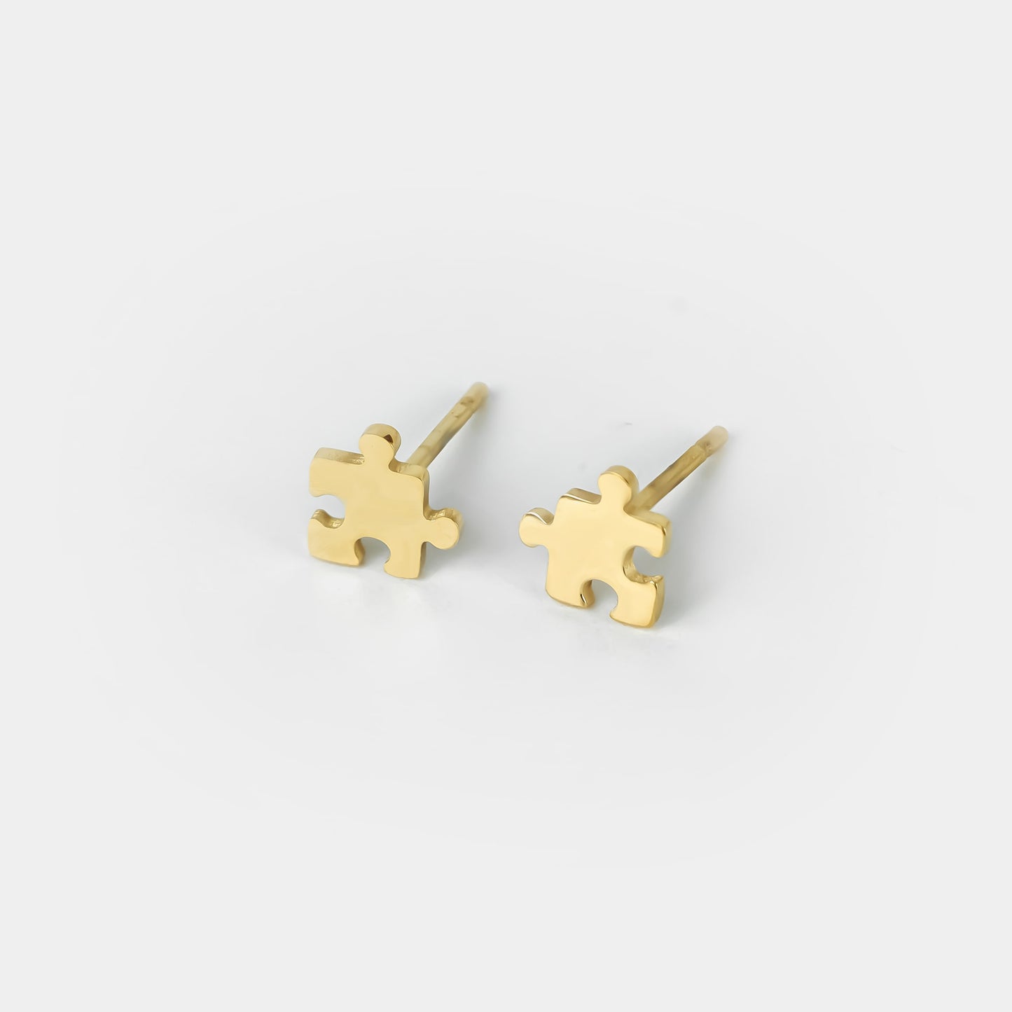 Mini pendientes Puzzle solidario