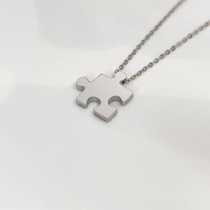 Collar Puzzle solidario