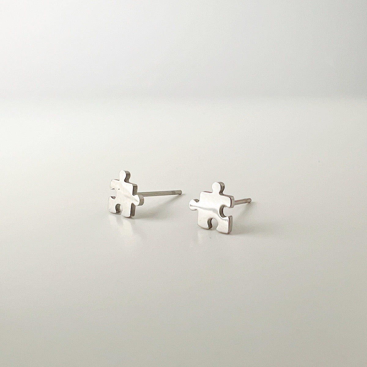 Mini pendientes Puzzle solidario